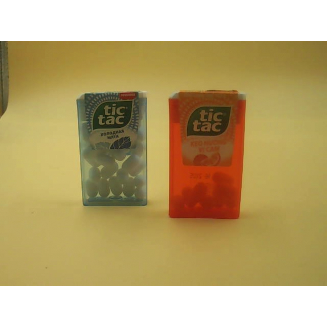 Набор из 2 леденцов Tic Tac от Ferrero, со вкусом мяты и апельсина.
