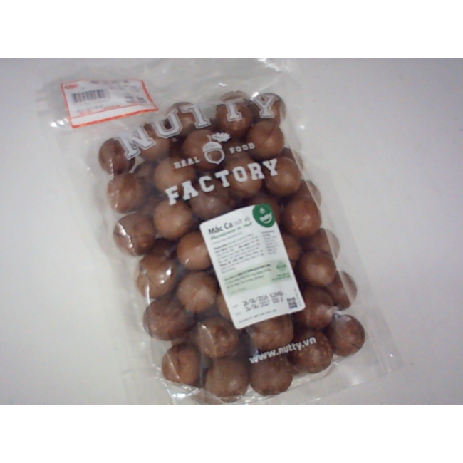 Жареные орехи макадамия марки Nutty в скорлупе.